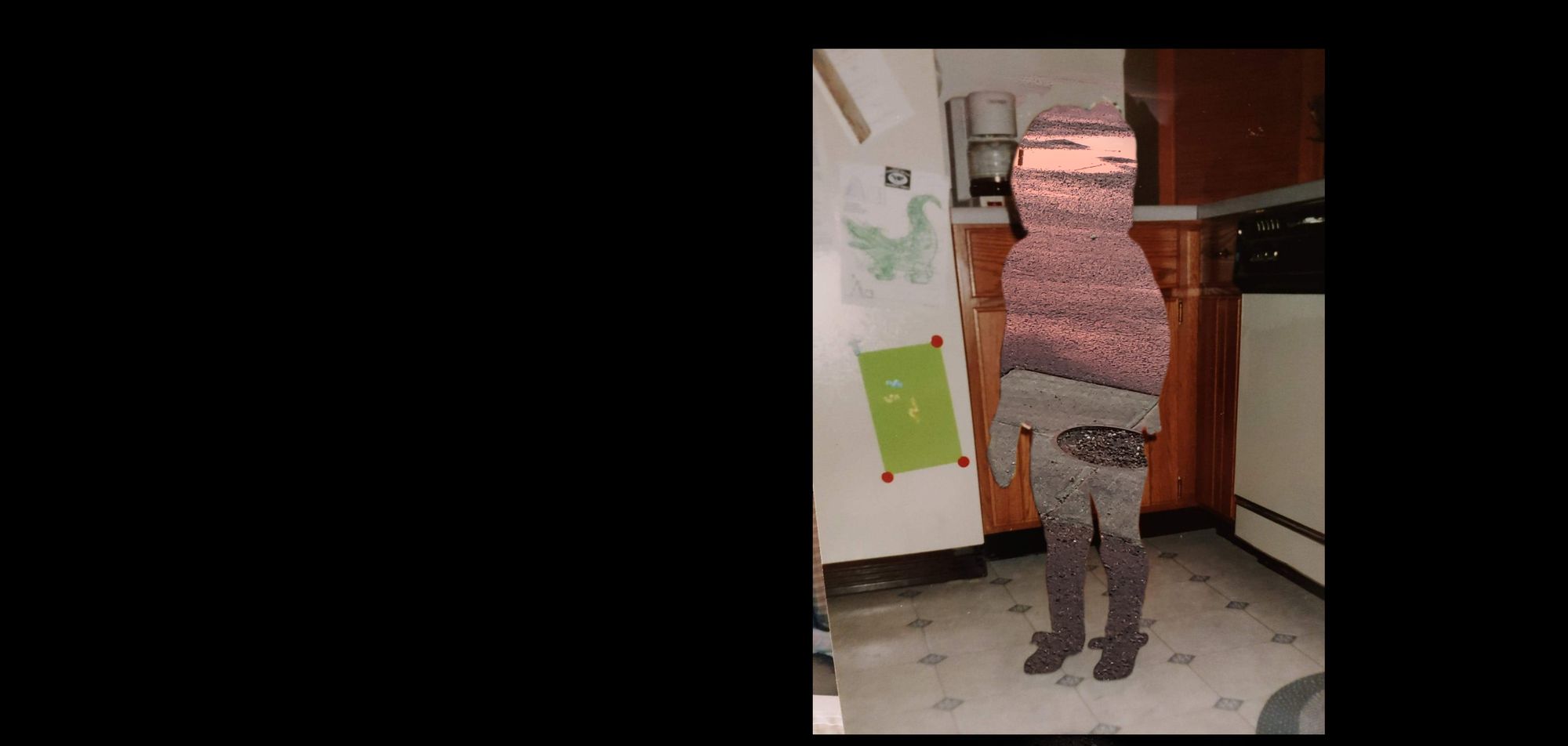 A child’s silhouette, made out of a sunset reflected on a wet road, stands in a kitchen with a linoleum floor.